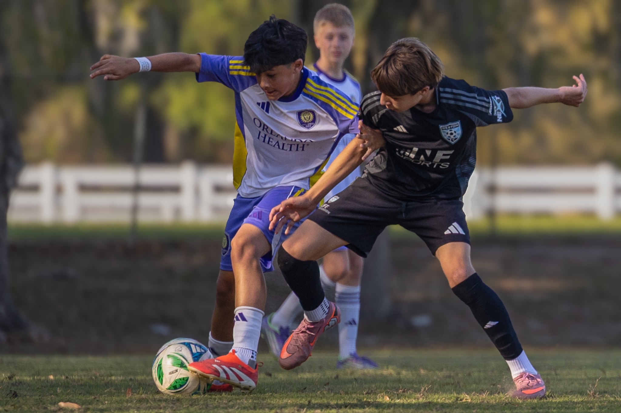 Youth soccer player ball control in game action — Daytona Beach FL sports photography — Heidi Lynne Photography