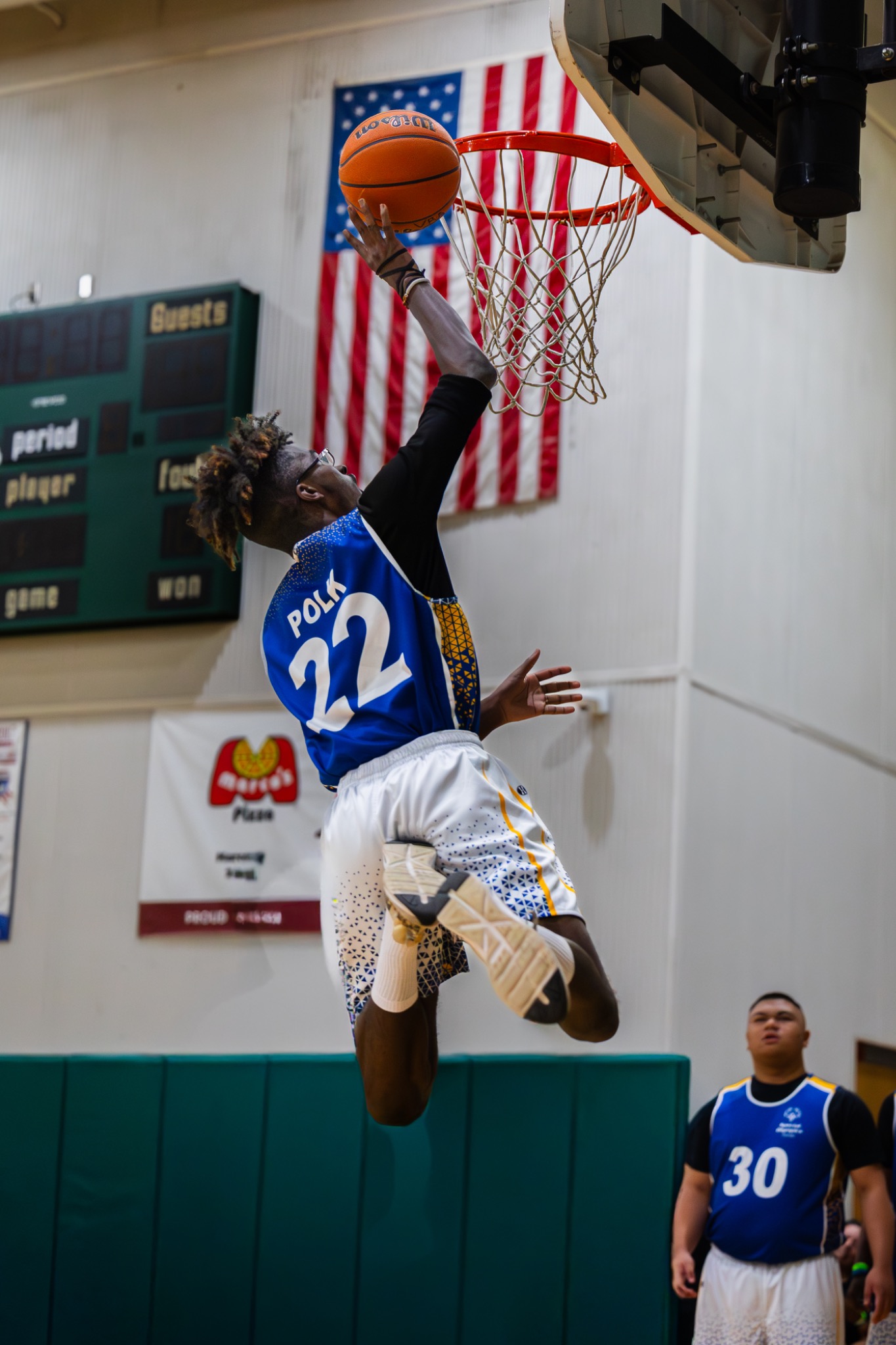Youth basketball player dunking in game action — sports action photography Daytona Beach FL — Heidi Lynne Photography