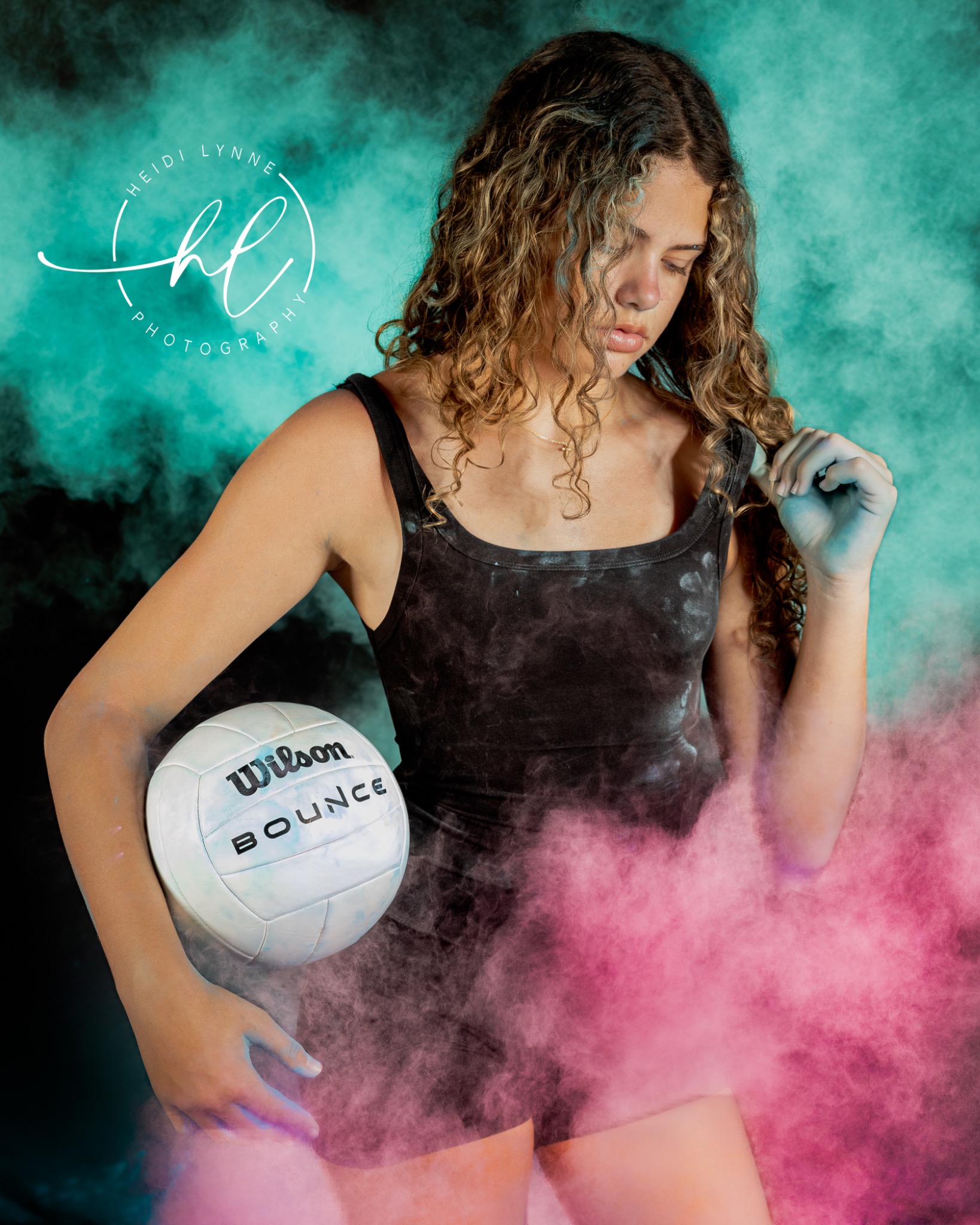 Volleyball athlete portrait with chalk powder effects creating bold visual impact for sports photography portfolio